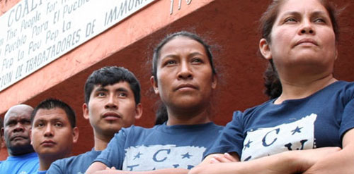 CIW members with arms crossed